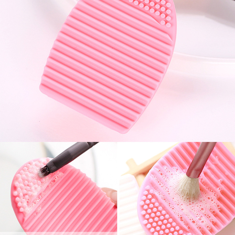 Custom logo Makeup brush cleaning egg handheld silicone brush cleaner with sunken texture anti-slip cleaning pad beauty tool